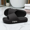 Black slides with 'original' branding on a marble surface