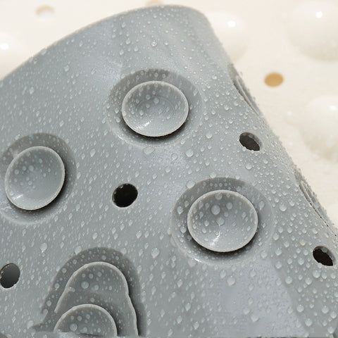 Close-up of waterproof suction cups on shower mat