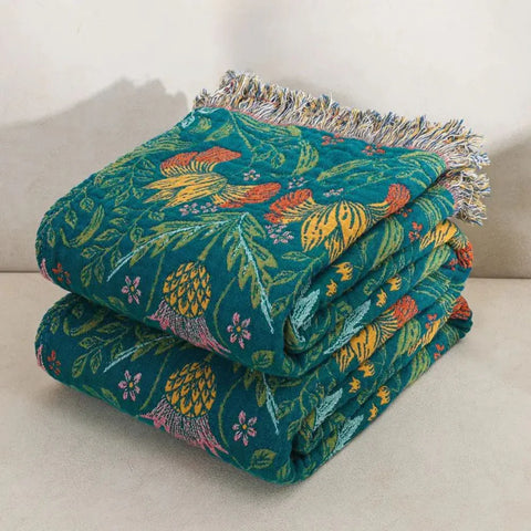 Folded Sunset Forest cotton blanket with colorful floral pattern