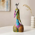 Tall abstract resin woman sculpture for elegant home goods display

