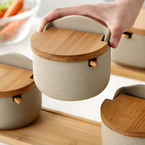 Top view of bamboo-lid ceramic jars on tray