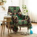 Tribal green and burgundy woven throw blanket on chair