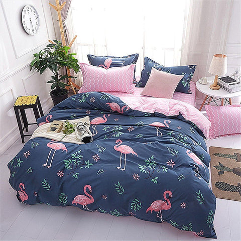 Flamingo print duvet cover bedding set with colorful sheets on twin bed