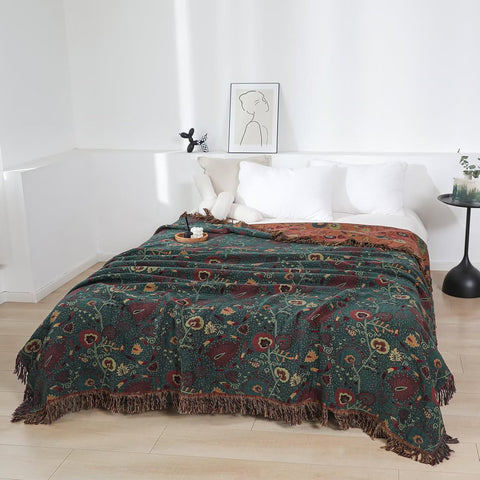 Another angle of vintage boho cotton throw blanket on bed, highlighting fabric texture and style.
