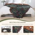 Vintage boho cotton throw blanket used as couch cover, bed blanket, decorative piece, and travel blanket.