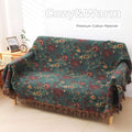 Vintage boho cotton throw blanket fully spread on sofa, illustrating soft and warm home ambiance.