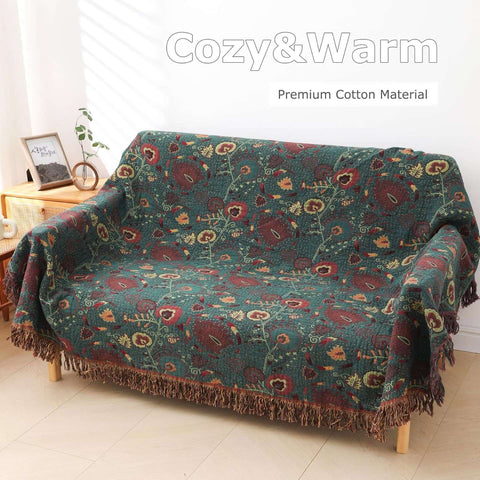 Vintage boho cotton throw blanket fully spread on sofa, illustrating soft and warm home ambiance.