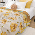Lightweight summer quilt with vintage sunflower print and ruffled edge