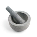 Top view of vintage grey marble mortar and pestle on white background