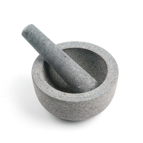 Top view of vintage grey marble mortar and pestle on white background