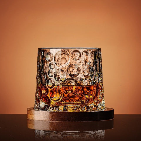 Unique bubble-textured glass with amber liquid