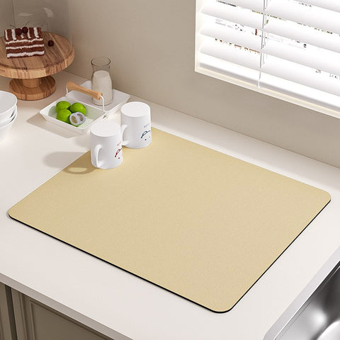 yellow kitchen drying mat on wooden counter in cozy kitchen corner